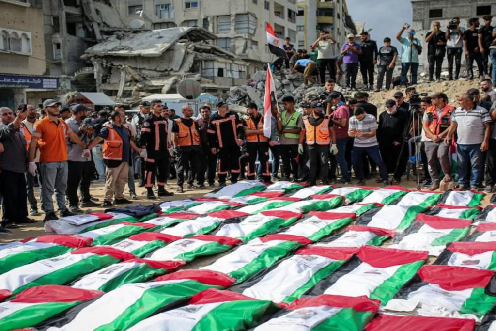 DRAMA: Enterro Coletivo Marca Recuperação de Corpos de Palestinos sob Escombros em Gaza